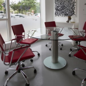 Clear Glass Round Meeting Table with Red Chairs
