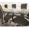 Glass Meeting Table with Black Chairs