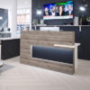 Reception desk in Grey Oak and white with feature panel